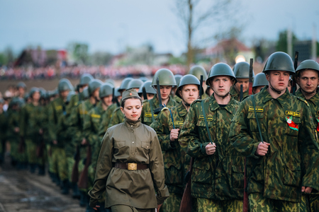 MOGILEV, BELARUS - MAY, 08, 2015: Parade of unidentified re-enactors dressed as Soviet soldiers during events dedicated to 70th anniversary of the Victory of Soviet people in the Great Patriotic War.のeditorial素材
