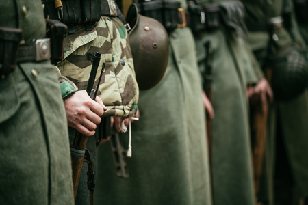Close up of german military ammunition of a German soldier. Unidentified re-enactors dressed as World War II German soldiers standing order.の写真素材