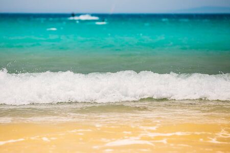 Fresh Sea Ocean Waves washing yellow sand.の写真素材