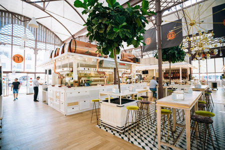 Seville, Spain - June 24, 2015: Food market and a Spanish restaurant Mercado Gourmet Lonja Del...