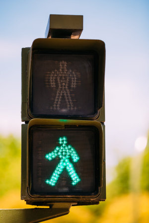 Green traffic light walk man. Road Safety