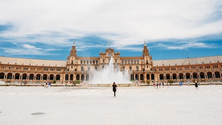 Plaza de Espana - landmark in Seville, Andalusia, Spain. Renaissance Revival style. Spain Square. Fountain. Sunny summer day. Panoramaの写真素材