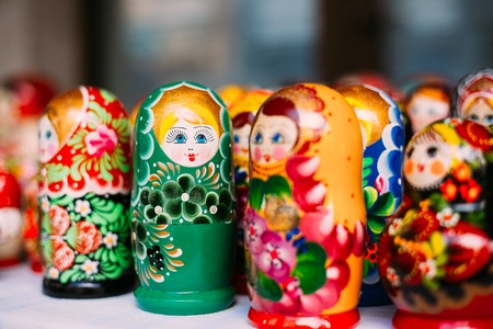 Beautiful Colorful Russian Nesting Dolls Matreshka At Market. Matrioshka Is Folks Cultural Symbol Of Russia. Wooden Doll Matryoshkaの写真素材