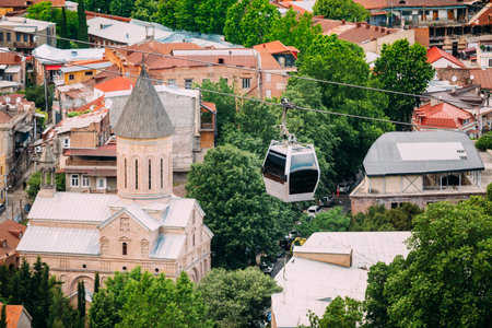 Top View Of Jvaris Mama Ancient Georgian Christian Church And Moving Car Of Cableway Under Old Part...
