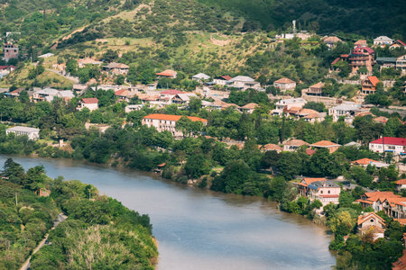 The Scenic Top View Of Mtskheta, Georgia. The Residential Area Along Bank Of The Aragvi River In...