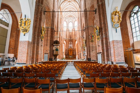 Riga, Latvia - July 1, 2016: The Nave Of St. Peter's Church Interior, The Central Part Of Church Building For Parishioners Accommodation.のeditorial素材