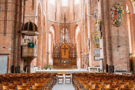 Riga, Latvia - July 1, 2016: The Nave Of St. Peter's Church Interior, The Central Part Of Church Building For Parishioners Accommodation.のeditorial素材