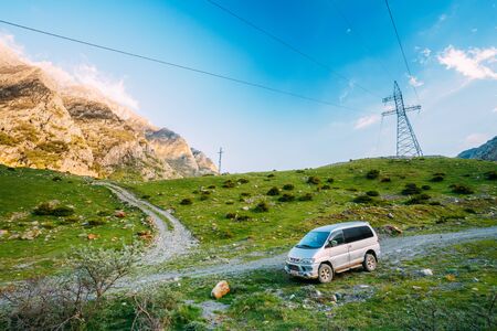 Darial Gorge, Georgia - May 21, 2016: Mitsubishi Delica Space Gear on off road in summer mountains landscape. Delica is a range of trucks and multi-purpose vehicles produced by Mitsubishi Motors.のeditorial素材