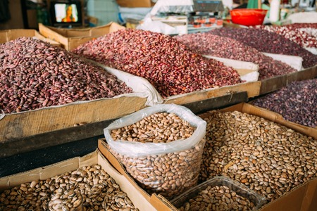 The Abounding Market Bazaar Showcase With Wide Range Of Varicolored Sorts Of Raw Dry Beans In Bulk In Trays For Sale.の写真素材