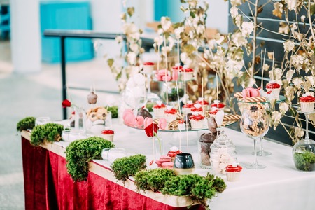 Dessert Sweet Tasty Cupcakes, Macarons And Cookies In Candy Barの写真素材