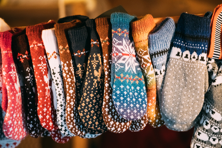 Knitted Traditional European Warm Clothes - Mittens At Winter Christmas Marketの写真素材