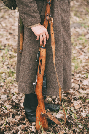 Russian Soviet Infantry Soldier Of World War II Holds Rifle Weapの写真素材