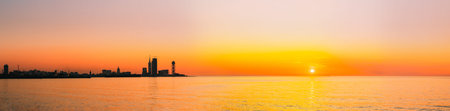 Batumi, Adjara, Georgia. Embankment At Sunset Sunrise. Bright Evening Skyの写真素材