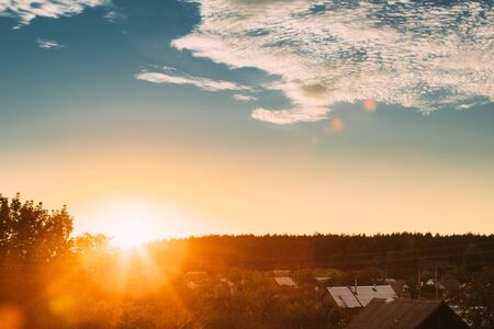 Sunset Sunrise Over Village In Belarusian Countryside. Bright Drの写真素材