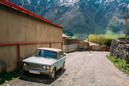 Russian Old rusty VAZ-2106 Zhiguli car sedan parking on villageのeditorial素材