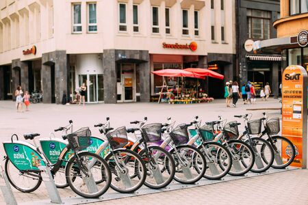 Riga, Latvia. Row Of Colorful Bicycles For Rent At Municipal Bikeのeditorial素材