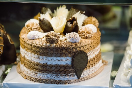 Fresh Sweet Cake With Different Chocolates In Pastry Shop Glassの写真素材