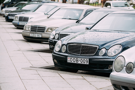 Batumi, Georgia - May 27, 2016: Different Cars Mercedes-Benz E-Class W210 And W211 Parked In Row In Street on Summer Day.のeditorial素材
