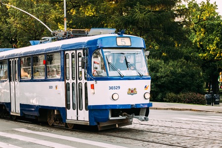 Riga, Latvia - July 2, 2016: Public old retro tram with the number of the fifth route on summer street Siegfried Anna Meierovics Boulevard in Riga, Latviaのeditorial素材