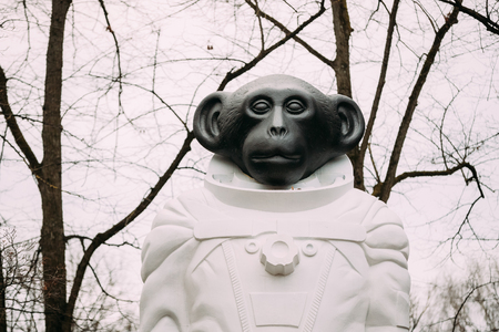 Riga, Latvia - December 13, 2016: Monkey statue in a spacesuit in Kronvalda park. Statue is dedicated to animals that participated in exploration of outer space. Author is artist Denis Prasolov.のeditorial素材