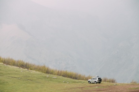 SUV Car On Off Road In Spring Mountains Landscape In Georgia. Drの写真素材