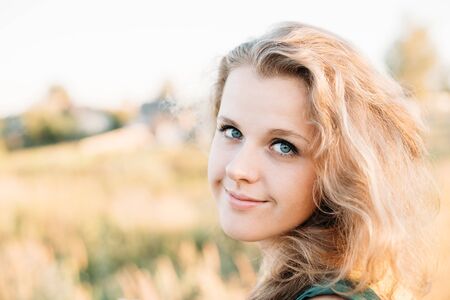Portrait Of Young Pretty Plus Size Caucasian Happy Girl Woman With Blue Eyes,の写真素材
