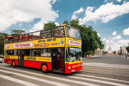 Riga, Latvia. Touristic Bus For Sightseeing In Kalku Street Withのeditorial素材