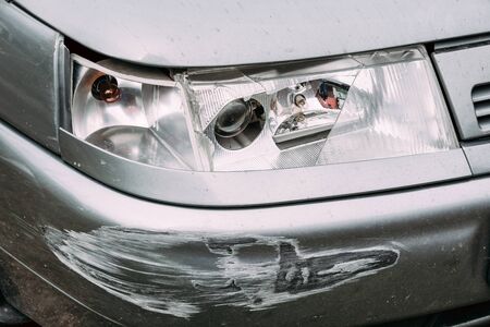 Broken Lamp Headlight And Bumper Car Scratched With Deep Damageの写真素材