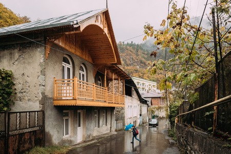 Borjomi, Samtskhe-Javakheti, Georgia. Boy crossing road under anのeditorial素材