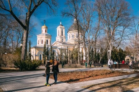 Gomel, Belarus. Two Teenage Girls Having Fun With Skateboard In City Parkのeditorial素材