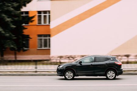 Compact crossover SUV Car Nissan Qashqai In Fast Motion On Streetのeditorial素材