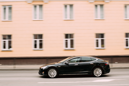 Black Color Tesla Model S Car In Motion On Street. The Tesla Model Sのeditorial素材