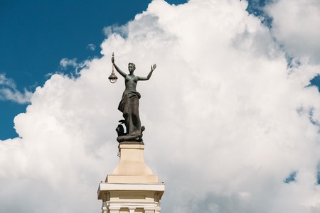 Vilnius, Lithuania. Statue Of A Woman With A Lantern In Her Handsのeditorial素材