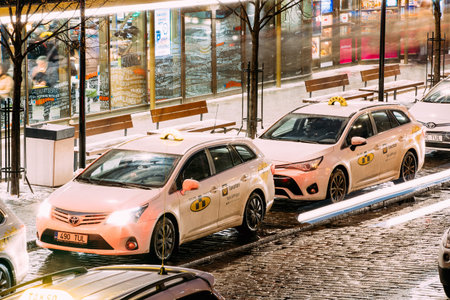 Tallinn, Estonia - December 3, 2016: Toyota Avensis Taxi Cars Parking Near Viru Gates Entrance To...