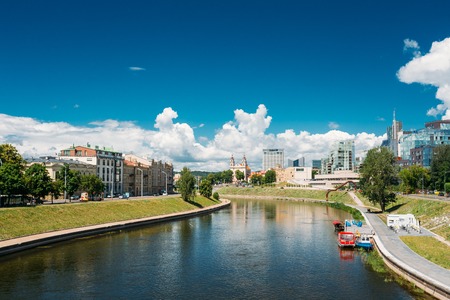 Vilnius, Lithuania  - July 5, 2016: Cityscape With Church Of St Raphael The Archangel And Former Jesuit Monastery, Radisson Blu Hotel In Sunny Summer Day.のeditorial素材