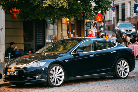 Tesla Model S Car In Motion On Street. The Tesla Model S Is A Full-sized All-electric Five-door,のeditorial素材