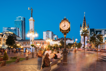 Batumi, Adjara, Georgia - September 8, 2017: People Resting Near Statue Of Medea In Europe Square In Evening.のeditorial素材