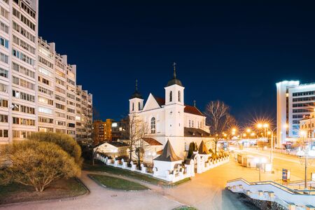 Minsk, Belarus - April 3, 2017: Evening Night View Of Cathedral of the Holy Apostles Sts Peter and Paul On Illuminated Nemiga Street. Temple of the Belarusian Exarchate of the Russian Orthodox Churchのeditorial素材