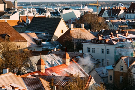 Tallinn, Estonia. Top View Of Old Tiles Roofs Of Residential Housesの写真素材