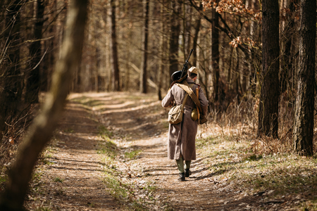Young unidentified re-enactor dressed as Soviet soldier machineの写真素材