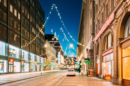 Helsinki, Finland. Night View Of Aleksanterinkatu Street With Railroadのeditorial素材
