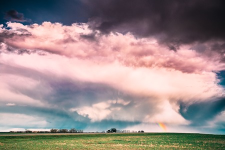 Car In Motion In Countryside Rural Field Spring Meadow Landscapeの写真素材