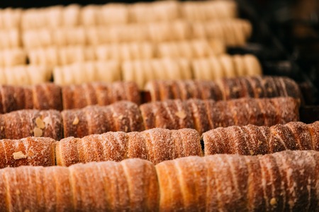 Prague, Czech Republic. Trdelnik Or Trdlo Is A Traditional Delicacy, Found In A Number Of Countries In Central Europe. It Is A Batch Of Yeast Dough, Wound On A Spit Of Wood Or Metal In A Spiral.の写真素材