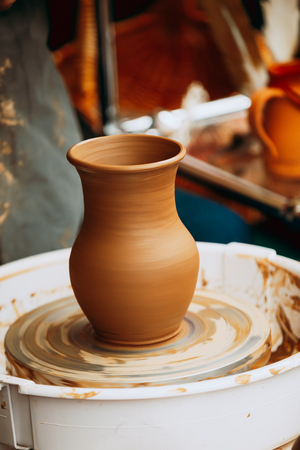 Pottery Craft Wheel And Ceramic Clay Pot. Traditional New Handmaの写真素材
