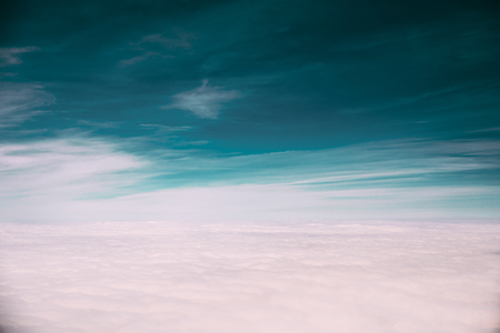 Beautiful View Of Sunny Sky Above White Fluffy Clouds From Heighの写真素材