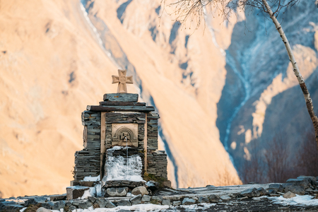 Stepantsminda, Gergeti, Georgia. Cross On Stones And Cold Mineraの写真素材
