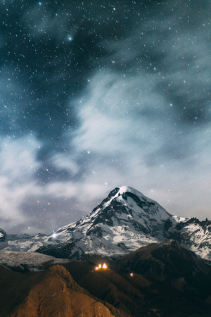 Stepantsminda, Georgia. Real Night Starry Sky With Glowing Starsの写真素材