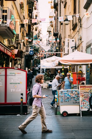 Naples, Italy. Young Caucasian Man Tourist Walking At Famous Via Toledo Streetのeditorial素材
