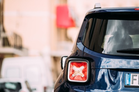 Terracina, Italy. Red Led Rear Lights Of Blue Jeep Renegade Bu 520 Car Parking At Street. Back Viewのeditorial素材