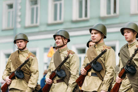 Gomel, Belarus - May 9, 2017: Group Of Re-enactos Dressed As Russian Soviet Red Army Soldiers Of World War Taking Part In Parade During Celebration Of Victory Day 9 May.のeditorial素材